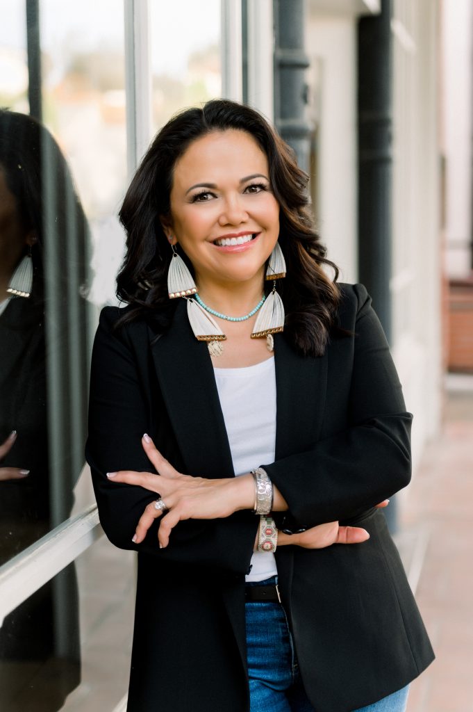 This news broadcaster is posing in Old Town Temecula for a business branding photo session done by Sharisse Rowan.